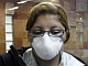 Mulher se protege com máscara em aeroporto da Bolívia.Foto: Reuters