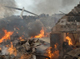 Volunteers fighting plane crash fire in GomaPhoto: AFP