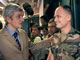 Hervé Morin, French defense minister congratulates Admiral Marin Gillier.(Photo : AFP)