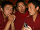Tibetan monks protesting at a press conference in March.(Photo : Reuters)