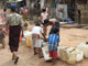 Yangon residents queue for water - not to vote (Photo: Luc Auberger)