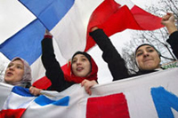 Muslim girls demonstrate in Paris, 2003