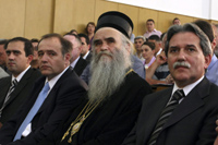 Serbia's Kosovo Minister Slobodan Samardzic (R) and Bishop Amfilohije (Centre)(Photo: Reuters)