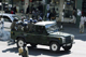 A police vehicle leaves the headquarters of Zimbabwe's opposition Movement for Democratic Change (MDC) in Harare June 23, 2008. Armed police raided the headquarters of MDC on Monday, detaining scores of victims of political violence who sought shelter in the building, the party said. (Photo: Reuters)