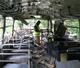 Police search the wreckage of a bus after a bomb explosion at Polgolla village, Kandy district 6 June 2008. (Photo: Reuters)