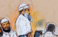 In this photograph of a sketch by courtroom artist Janet Hamlin, reviewed by the US Military, Khalid Sheikh Mohammed stands during the court hearing (Photo: Reuters)