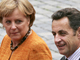 Sarkozy and Merkel at the summit (Photo: Reuters)