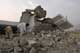 Tribesmen sift through residential rubble after US air strike(Credit: Reuters)