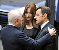 France's President Nicolas Sarkozy (R) and wife Carla Bruni-Sarkozy offer condolences to Pierre Bergé (L) as they arrive at the funeral service for fashion designer Yves Saint Laurent in Paris. Bergé was Saint Laurent's life-long companion and business partner.(Photo: Reuters)