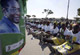 Supporters chant in front of a poster of Zimbabwean President Robert Mugabe during an election rally (Credit: Reuters)
