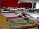 Beds line the floor of the auditorium at Paris' labour exchange.(Photo: M Chown Oved)