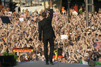 Barack Obama waves to the crowd in Berlin.