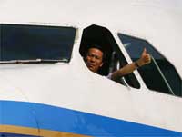 China Southern Airlines chiarman Liu Shao-yang piloting the first direct China-Taiwan flight(Photo: Reuters)