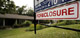 A foreclosure sale sign in front of a house in Falls Church, Virginia(Photo: Reuters)