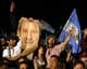 Rural farmers cheer after the vote(Credit: Reuters)