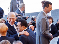 Israeli Prime Minister Ehud Olmert (L), Egyptian President Hosni Mubarak, and Syrian President Bashar al-Assad (R) in Paris.(Photo : Reuters/Vincent Kessler)