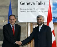 EU foreign policy chief Javier Solana (l) shakes hand with Iran's chief nuclear negotiator Saeed Jalili(Credit: Reuters)
