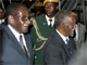 Thabo Mbeki (R) is greeted by Robert Mugabe in Harare.(Photo: Reuters)