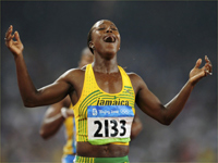 Veronica Campbell-Brown celebrates after winning the women's 200m (Photo: Reuters)