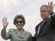 President George Bush and his wife before they left for Asia.(Photo : Reuters)