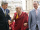 French Senator Louis de Broissia (L) and Deputy Lionnel Luca (R) escort Tibetan spiritual leader Dalai Lama (C) as he arrives to attend a meeting at the Senate in Paris 13 August 2008.(Photo : Reuters)
