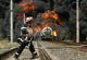 A firefighter walks in front of a burning fuel train with oil from Azerbaijan in Gori, 80 km (50 miles) from Tbilisi 24 August 2008. The train exploded on Sunday on Georgia's main east-west rail line and police said it appeared to have hit a landmine. REUTERS/David Mdzinarishvili (GEORGIA)(Photo: Reuters)
