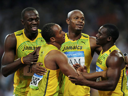 (From L to R) Usain Bolt of Jamaica celebrates with his teammates Michael Frater, Asafa Powell and Nesta Carter.(Reuters)