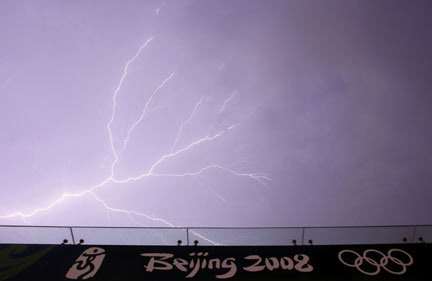 Lightning over Beijing - storms played havoc with  Thursday's schedule(Photo: Reuters)