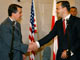 US negotiator John Roods and Polish Foreign Minister Radoslav Sikorski.(Photo : Reuters)