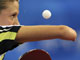 Natalia Partyka of Poland hits a shot to Tie Yana of Hong Kong during their women's team group C singles table tennis match at the Beijing 2008 OIympic Games August 13, 2008(Photo: Reuters)