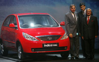 Tata executives present the Nano in Munbai Saturday(Photo: Reuters)