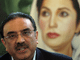 Asif Ali Zardari in front of a picture of his wife(Photo: AFP)