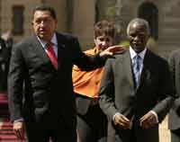 Hugo Chavez meets with Thabo Mbeki.(Photo: REUTERS/Siphiwe Sibeko (SOUTH AFRICA)