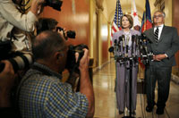 House Speaker Nancy Pelosi (L) and Rep Barney Frank (R) speak to reporters(Photo: Reuters)