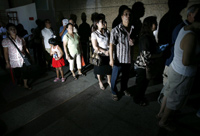 Singaporeans queue to pull their money out of AIG unit, AIA(Photo: Reuters)
