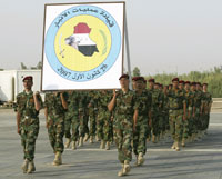Iraqi soldiers carry the logo of Anbar Province.(Photo : Reuters)