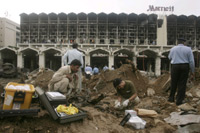The search for clues in the wreckage of the Marriott(Photo: Reuters)