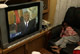 A girl watches deposed South African President Thabo Mbeki address the nation(Credit: Reuters)