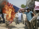 Pakistani traders burn a U.S. flag to protest against strikes in Pakistani tribal areas along the Afghan border, in Multan September 10, 2008. Missiles fired by U.S. drones killed 23 people, most of them family members of a Taliban commander close to Osama bin Laden, in a strike in a Pakistani region near the Afghan border on Monday, witnesses and intelligence officials said. REUTERS/Asim Tanveer(Photo: Reuters)