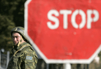 A Russian soldier mans a checkpoint west of Tbilisi (Photo: Reuters)