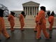  Demonstrators representing prisoners at the US Guantanamo Bay Naval Base stand before the US Supreme Court during a rally against torture sponsored by Witness Against Torture with Amnesty International and the National Religious Campaign Against Torture 11 January, 2008 in Washington, DC.( Photo : AFP )