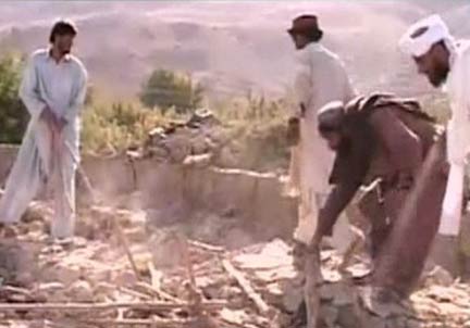 Residents dig through rubble in Ziarat(Photo: Reuters/Express TV)