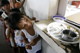 Children in a Philippines slum queue for free meals(Photo: Reuters)