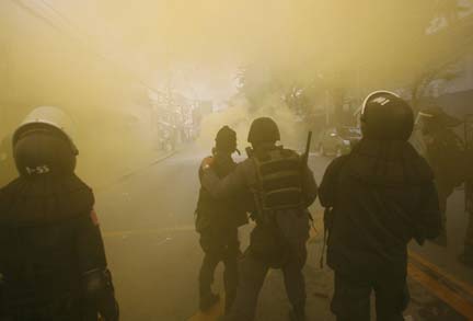 Riot police fire teargas outside parliament(Photo: Reuters)