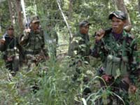 Cambodian troops patrol near Preah Vihear temple(Credit: Reuters)