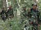 Cambodian troops patrol near Preah Vihear temple(Credit: Reuters)