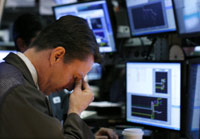 A trader reacts on the floor of the US NYSE Monday(Credit: Reuters)