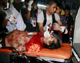 Paramedics transport an injured man to a hospital after the grenade attack(Photo: Reuters)