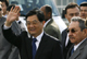 China's President Hu Jintao waves while walking with his Cuban counterpart Raul Castro shortly before his departure at Havana's Jose Marti airport November 19, 2008. Hu agreed to put off some of Cuba's debt payments and gave the island $80 million for hospital modernization and other projects during a visit on Tuesday to strengthen ties between the Communist-run countries. REUTERS/Enrique De La Osa (Photo: Reuters)