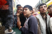 People gather at a store at Chinatown in Lima. Peru has South America's most notable Chinese community and is one of the two earliest Chinatowns in the Western Hemisphere, along with that of Havana. (Photo: Reuters)